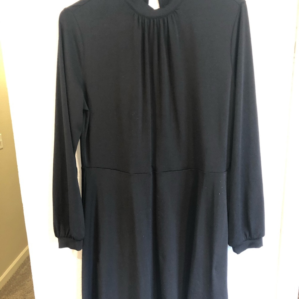 Black dress, goes to knee